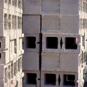 Lightweight manufactured concrete products